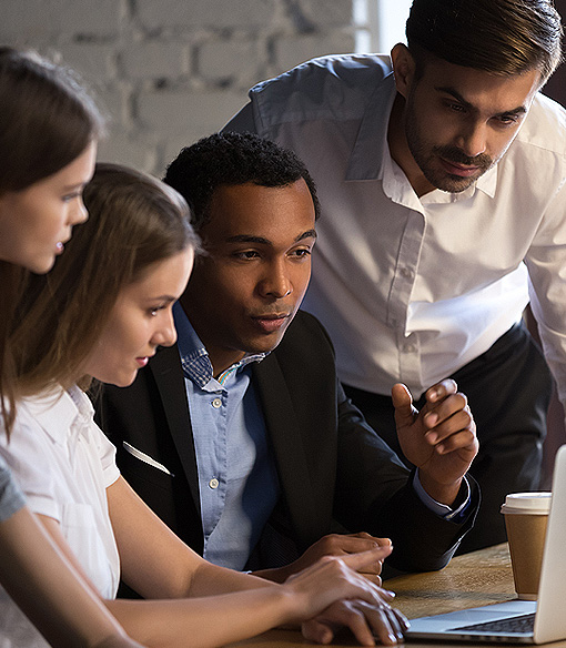 A PlanetLink consultant working with a client team